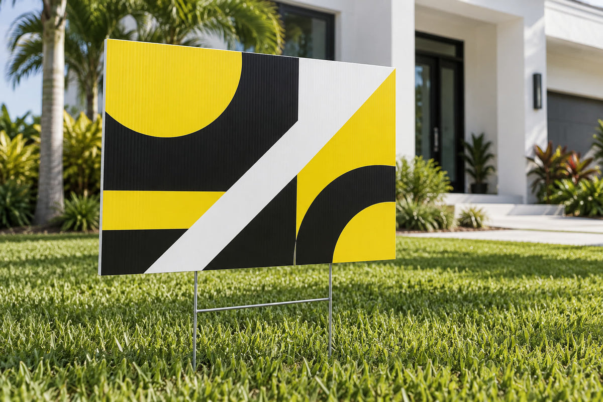 Yard sign on a wire stake in front of a home